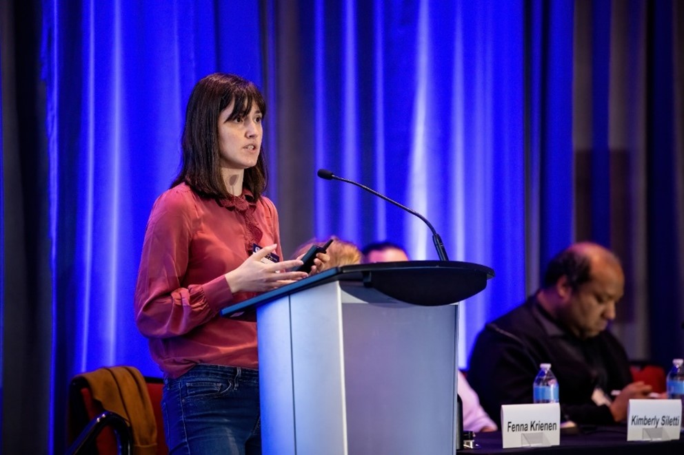 Dr. Kimberly Siletti speaking to the symposium audience.